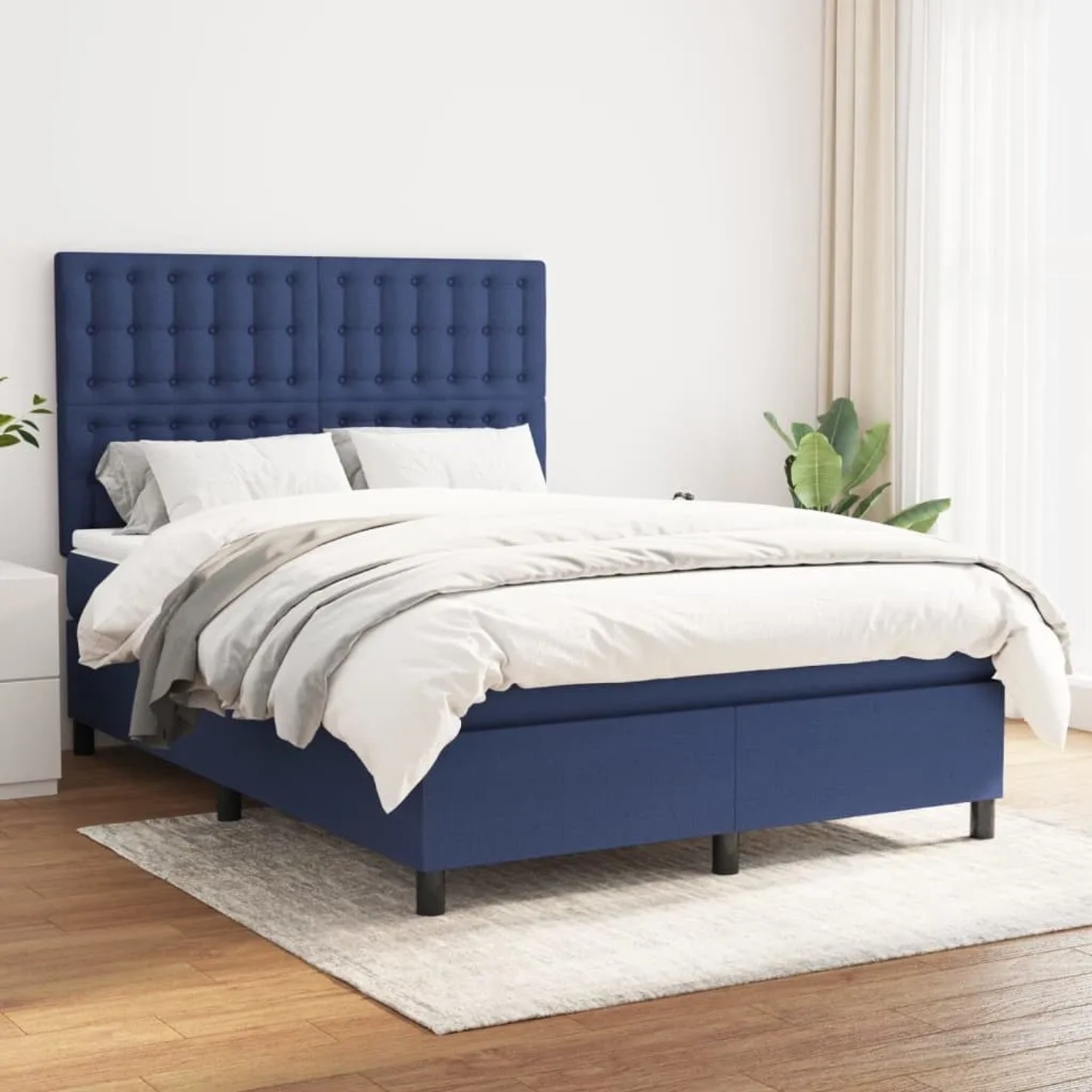 Blaues vidaXL Boxspringbett (140x200 cm) mit Matratze und Stoffbezug.