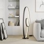 Moderne, dimmbare LED Stehlampe Bronwyn in Schwarz. Geschwungenes Design aus Aluminium für Wohnzimmer.