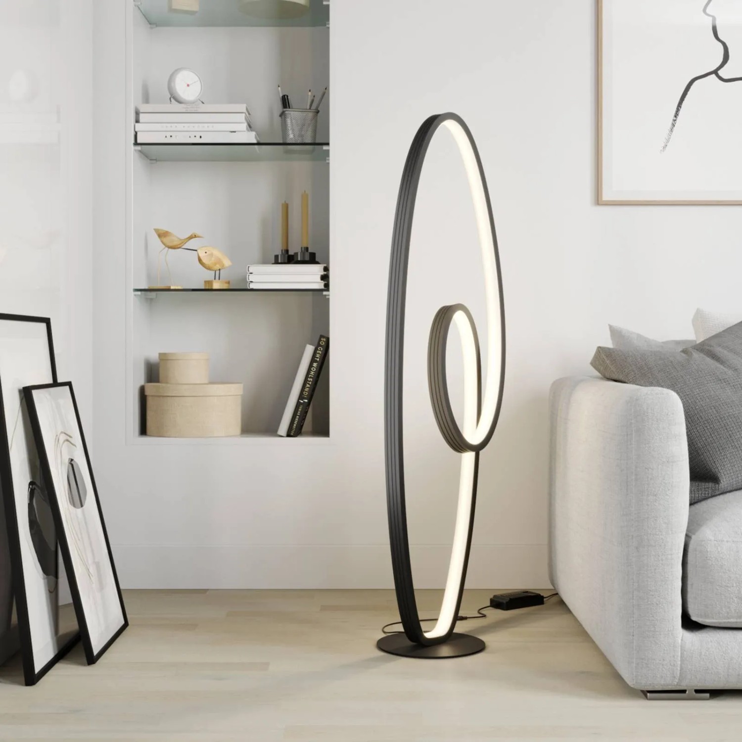 Moderne, dimmbare LED Stehlampe Bronwyn in Schwarz. Geschwungenes Design aus Aluminium für Wohnzimmer.