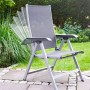 Kettler Basic Plus Gartensessel silber, graue Textilbespannung, verstellbare Rückenlehne auf Terrasse.