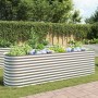 furnicato Garten-Hochbeet aus verzinktem Stahl, silbern, bepflanzt mit Blumen und Kräutern.