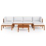 7-teiliges Garten Lounge Set aus Akazienholz mit cremefarbenen Kissen und Seilrückenlehne.
