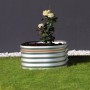 Rundes Vitavia Hochbeet Vita 401 aus Zink-Alu mit Bepflanzung im Garten.