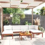 7-teiliges Garten Lounge Set aus Akazienholz mit cremefarbenen Kissen und Seilrückenlehne.