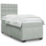Helles, graues vidaXL Boxspringbett (90x190 cm) mit Samtbezug, Matratze und Kopfteil.