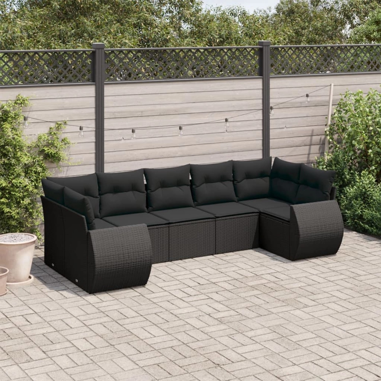 Schwarze 7-tlg. vidaXL Garten-Sofagarnitur aus Poly Rattan mit Kissen.