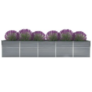 Graues vidaXL Garten-Hochbeet aus Stahl, bepflanzt mit lila Zierlauch.