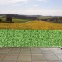 PROREGAL Balkonsichtschutz mit hellgrünen Blättern vor Landschaft