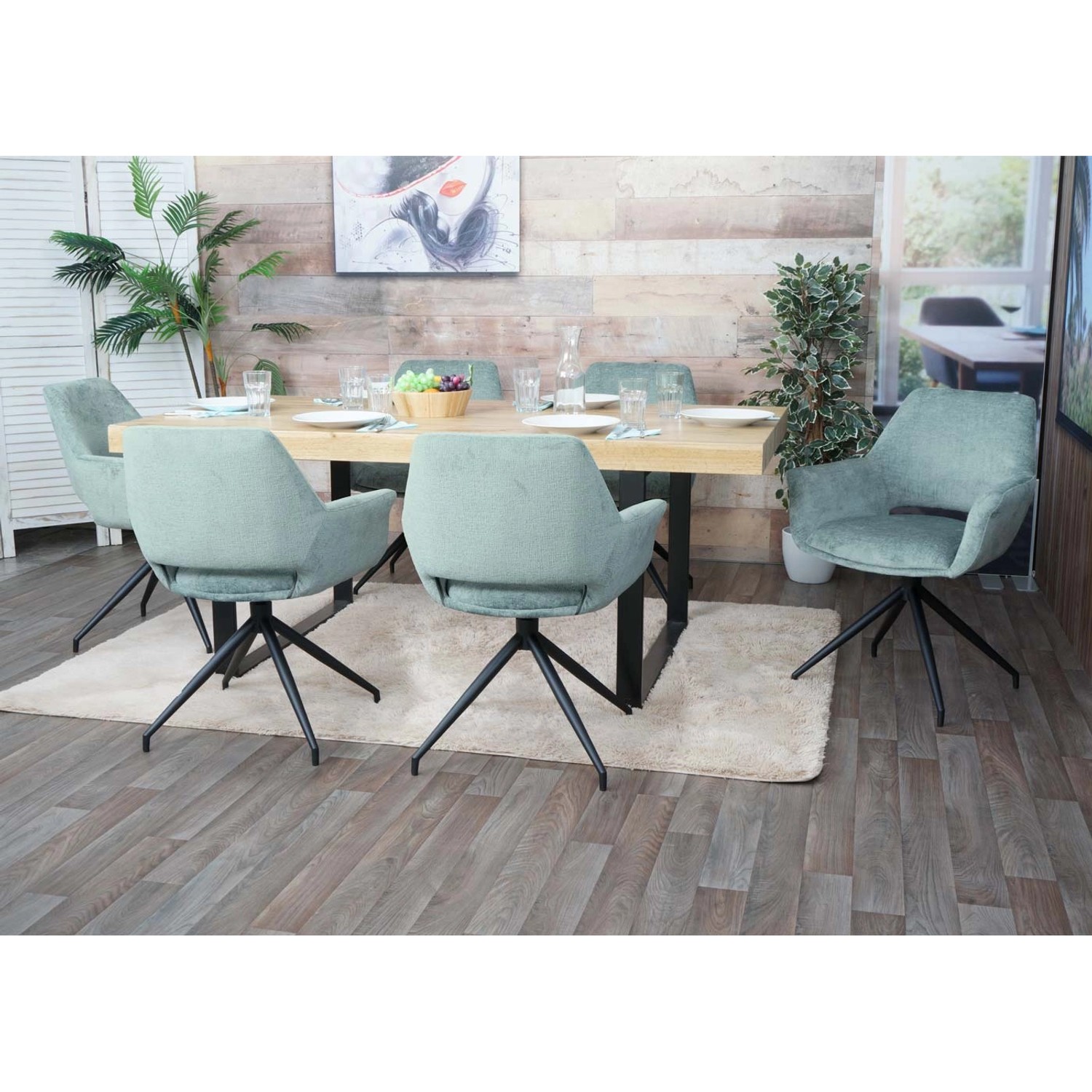 Esszimmerstühle MCW M53 in Grau-Blau am Esstisch. Polsterstühle mit Armlehnen und Stativgestell.