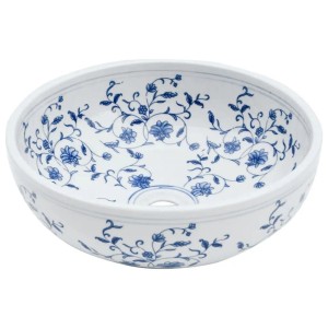 Rundes Aufsatzwaschbecken in Weiß-Blau mit floralem Muster, Ø41 cm.