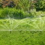 Gardena Versenkregner MD80 bewässert Rasenfläche. Sprinkler-System im Einsatz.