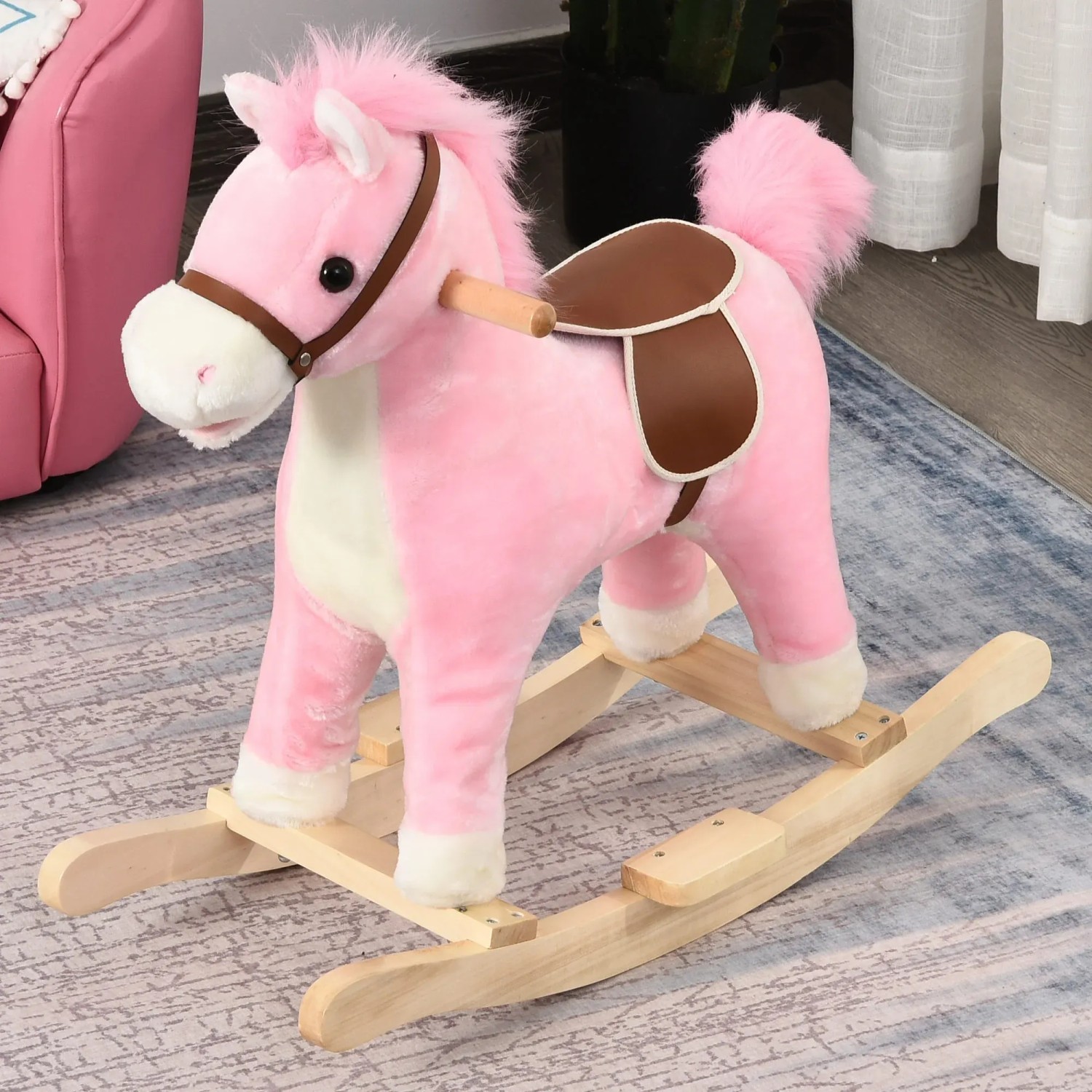 Rosa HOMCOM Schaukelpferd mit Sattel und Haltegriffen für Kinder.