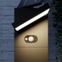 Moderne schwarze Lucande LED Solar-Wegeleuchte Silvan mit Bewegungsmelder und drehbarem Leuchtkopf.