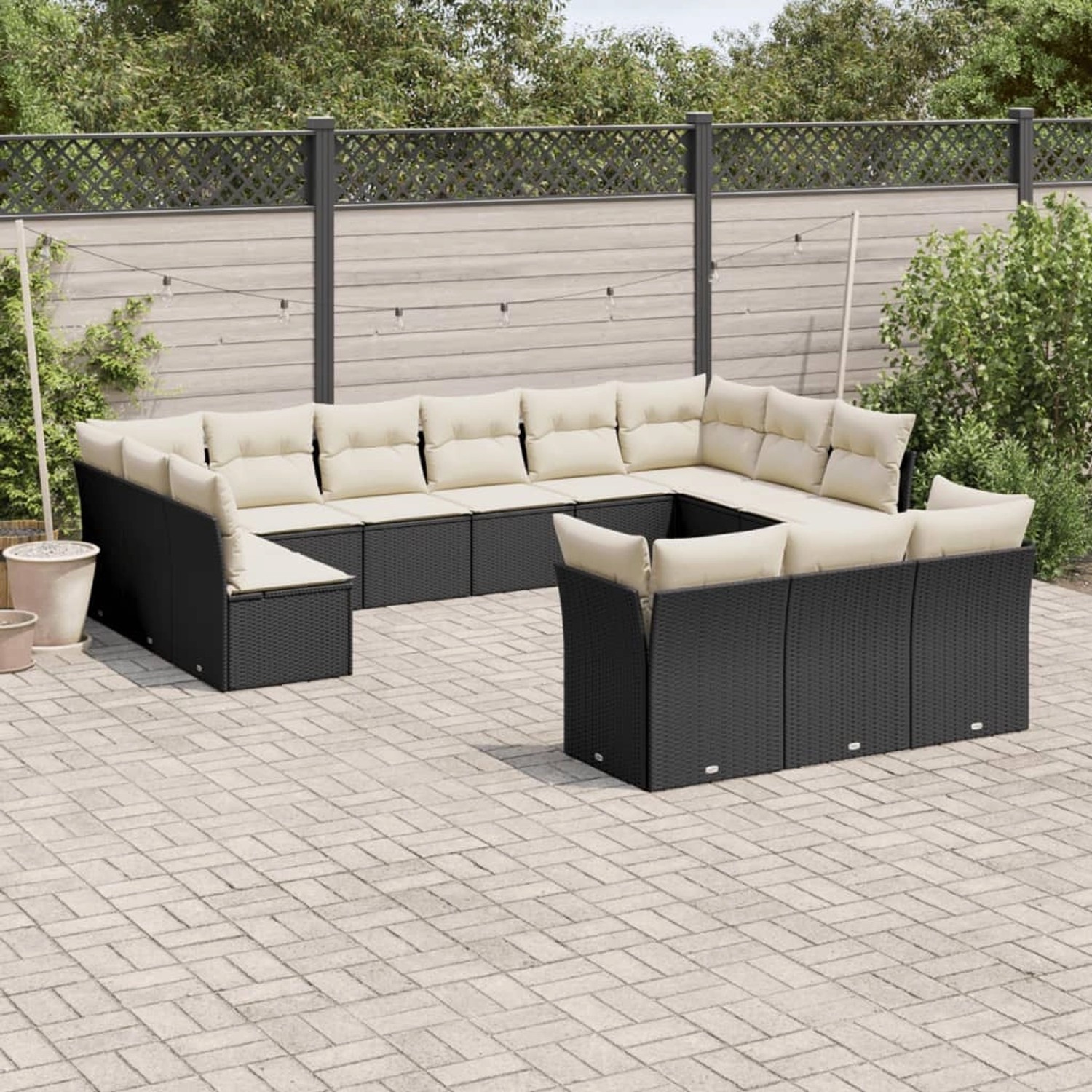 Schwarze vidaXL Garten-Sofagarnitur aus Polyrattan mit cremeweißen Kissen, 13-teilig.