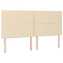 Cremefarbenes Boxspringbett-Kopfteil aus Stoff, 180x200 cm, mit Holzfüßen.