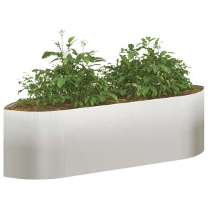 Modernes, gebogenes vidaXL Hochbeet aus Stahl in Edelstahl-Optik, 140x40x40 cm, mit grünen Pflanzen für den Garten.