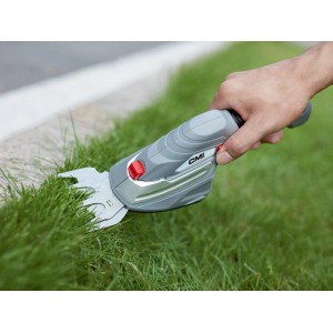 CMI Akku Gras- und Strauchschere beim Schneiden von Rasenkanten.