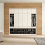 Wohnraum mit Egger Decowall DO008 Loveland Eiche als Wandverkleidung hinter einem Einbauschrank.