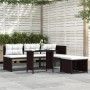 Braunes 4-tlg. vidaXL Garten-Lounge-Set aus Polyrattan mit Tisch, Hocker, Sofa und Liege.