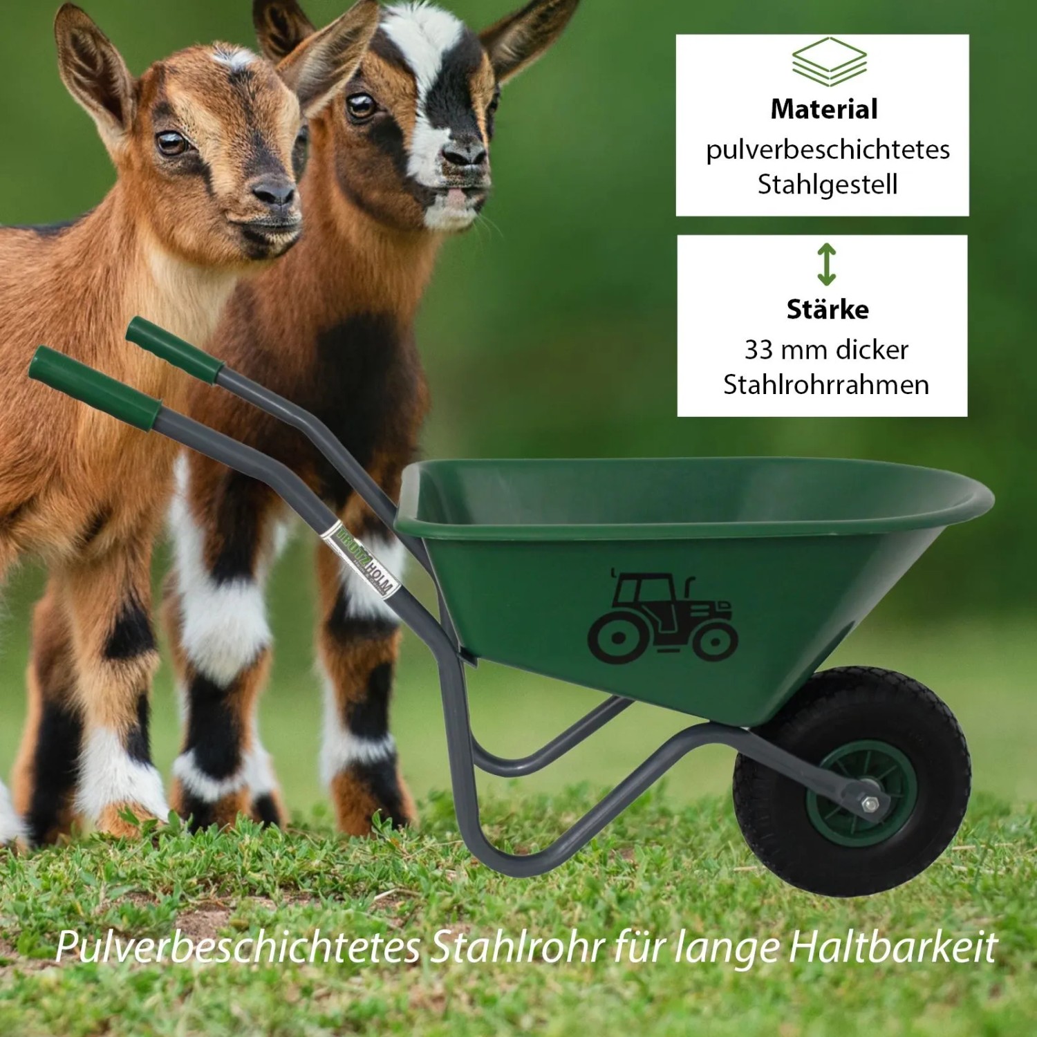 Grüne TRUTZHOLM Kinderschubkarre mit Trecker Motiv und Ziegen im Hintergrund.