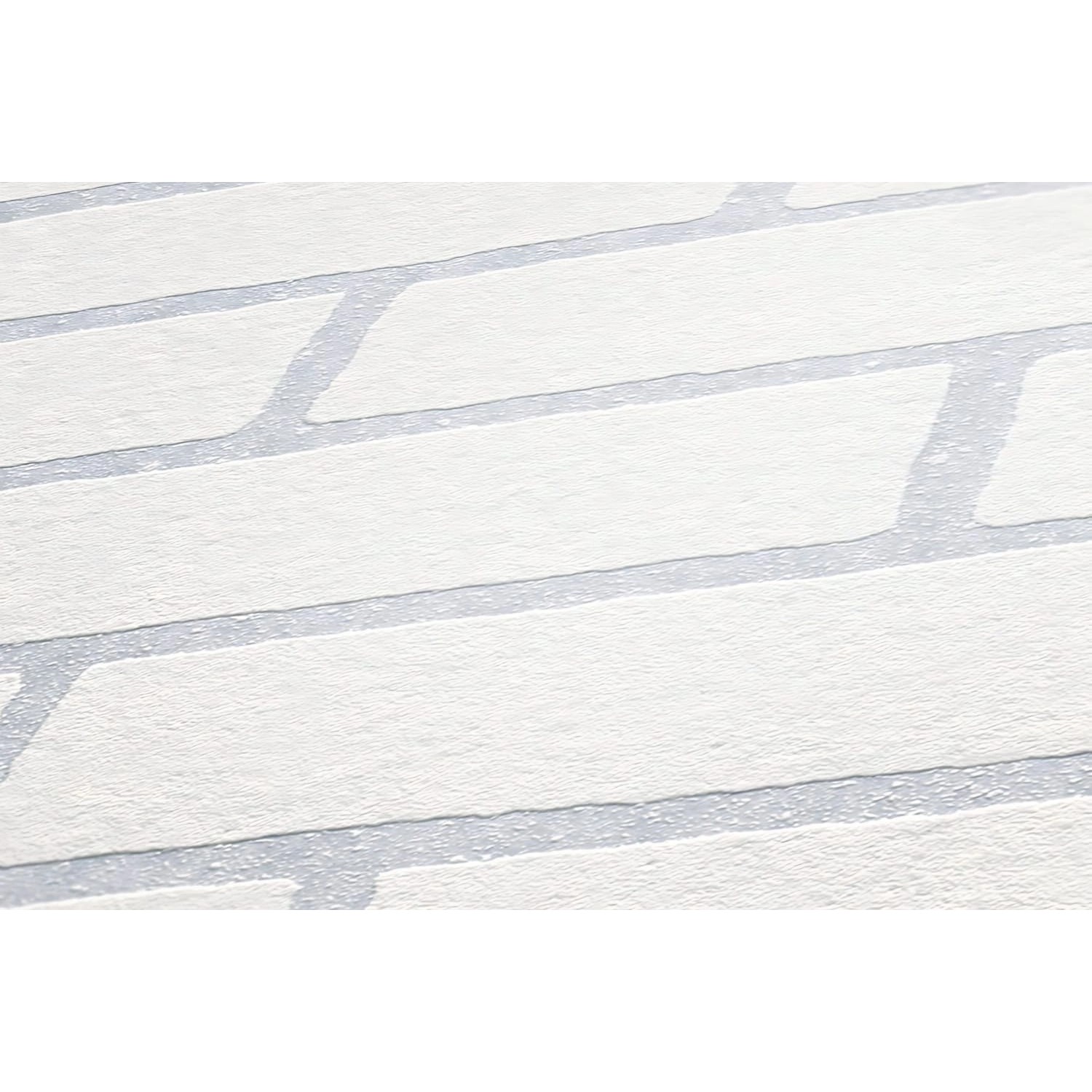 Weiße Vliestapete in Steinoptik zum Überstreichen, matte Oberfläche.