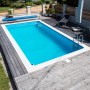Steinbach Styropor Pool-Set Basic, 700x350x150 cm, eingebaut in Holzterrasse im Garten.