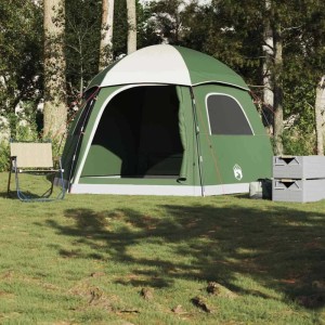 Grünes Iglu-Familienzelt für 6 Personen im Freien. Wasserdichtes Campingzelt mit weißer Kuppel und offenem Eingang.