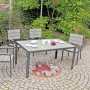7-teiliges Gartenmöbel-Set Olivia von Garden Pleasure in Grau mit Tisch und 4 Stühlen.