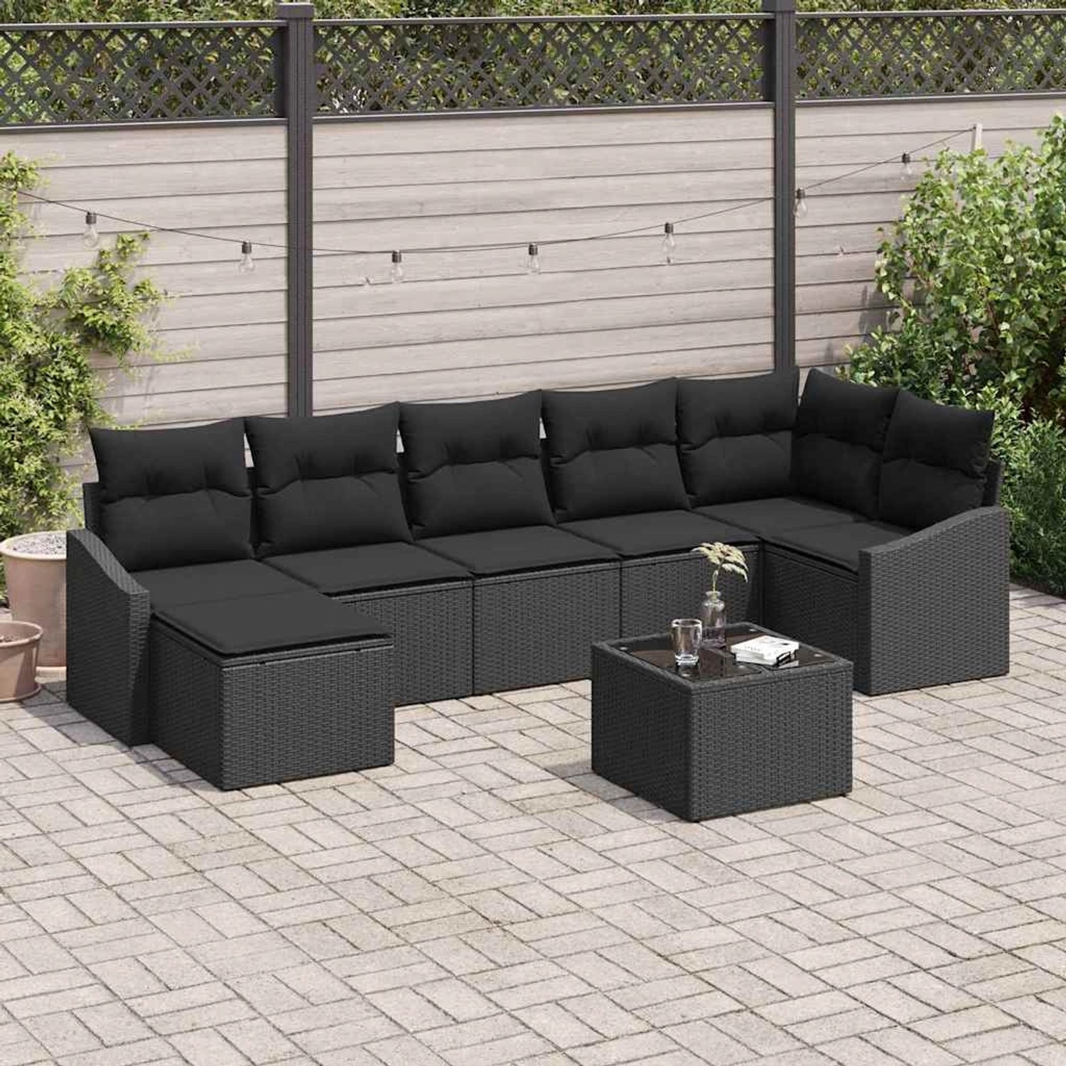 Schwarzes 8-teiliges Garten-Sofa-Set aus Poly Rattan von vidaXL mit Tisch und Auflagen.