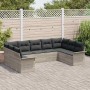 Hellgraues 9-teiliges Garten-Sofa-Set aus Poly Rattan mit grauen Kissen.