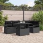 Schwarzes 6-tlg. Garten-Sofa-Set aus Poly Rattan mit Tisch und schwarzen Kissen.