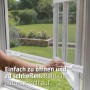 Anthrazit Insektenschutzrollo mit Kassette am Fenster, einfache Bedienung.