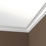 Weiße PROFHOME Eckleiste als Stuckleiste an Decke und Wand im Innenraum.