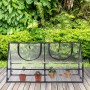 Transparentes Foliengewächshaus 60x120x60 cm mit dunklem Rahmen, zwei Fenstern und Jungpflanzen auf Holzterrasse.