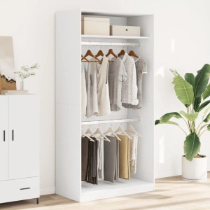 Weißer Kleiderschrank (100x50x200 cm) aus Holzwerkstoff mit Kleidung und zwei Fächern.
