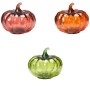 Drei gerippte Kürbis Glaslampen in Rot, Orange und Grün, als dekorative Figuren für Herbst und Halloween.
