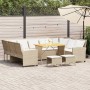 Beige 4-teilige Garten-Sofagarnitur aus Rattan mit Tisch und Kissen.