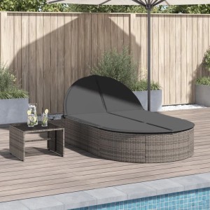 Graue vidaXL Doppel-Sonnenliege aus Rattan mit Kissen auf Terrasse am Pool.