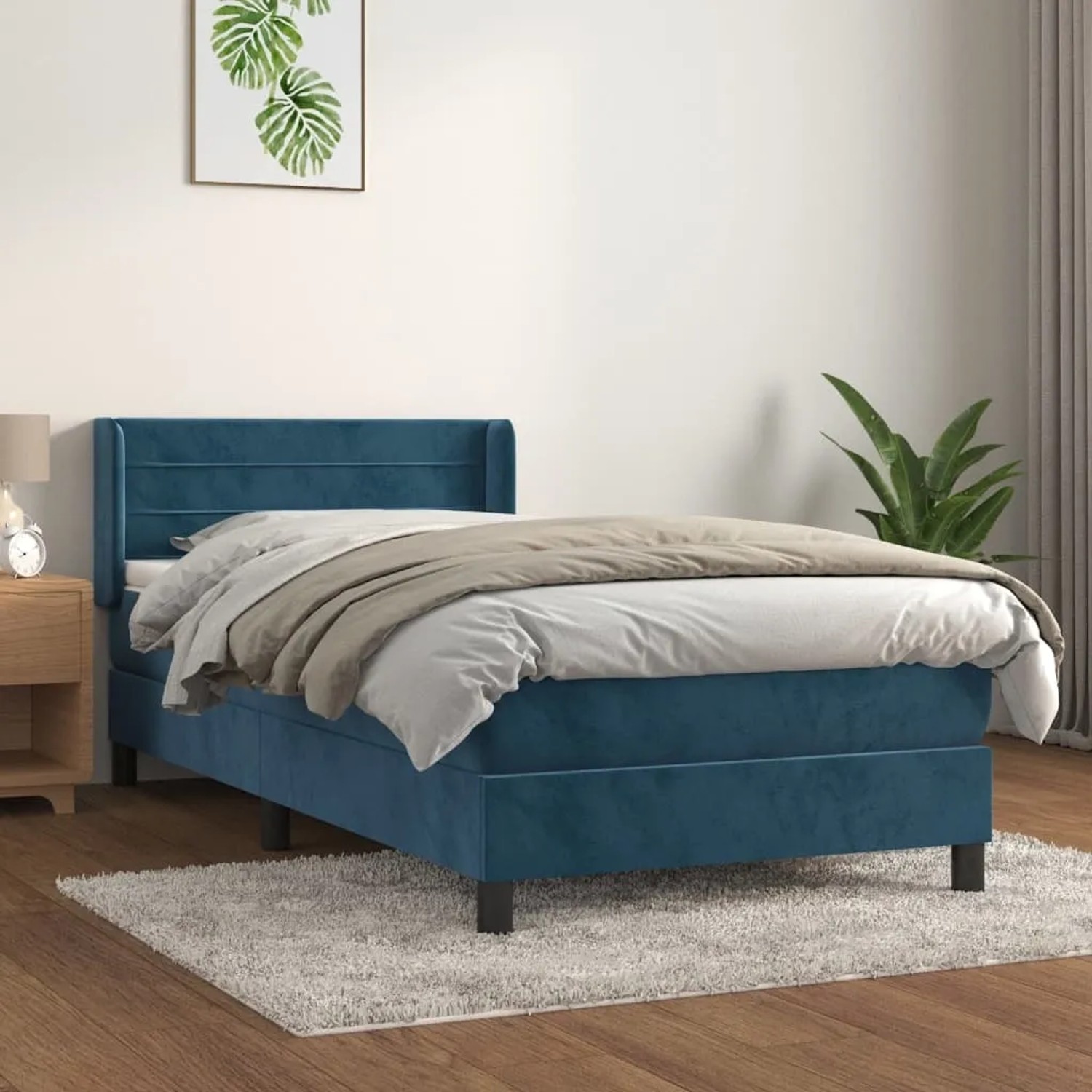 Dunkelblaues vidaXL Boxspringbett (90x190 cm) mit Matratze und Kopfteil aus Samt.