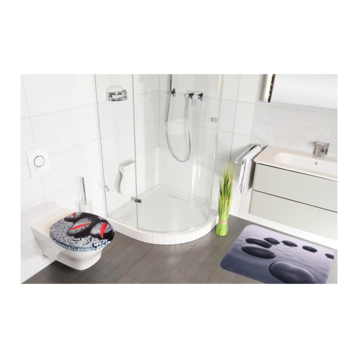 Sanilo Badteppich Black Stones (70x110cm) und WC-Sitz im Badezimmer.