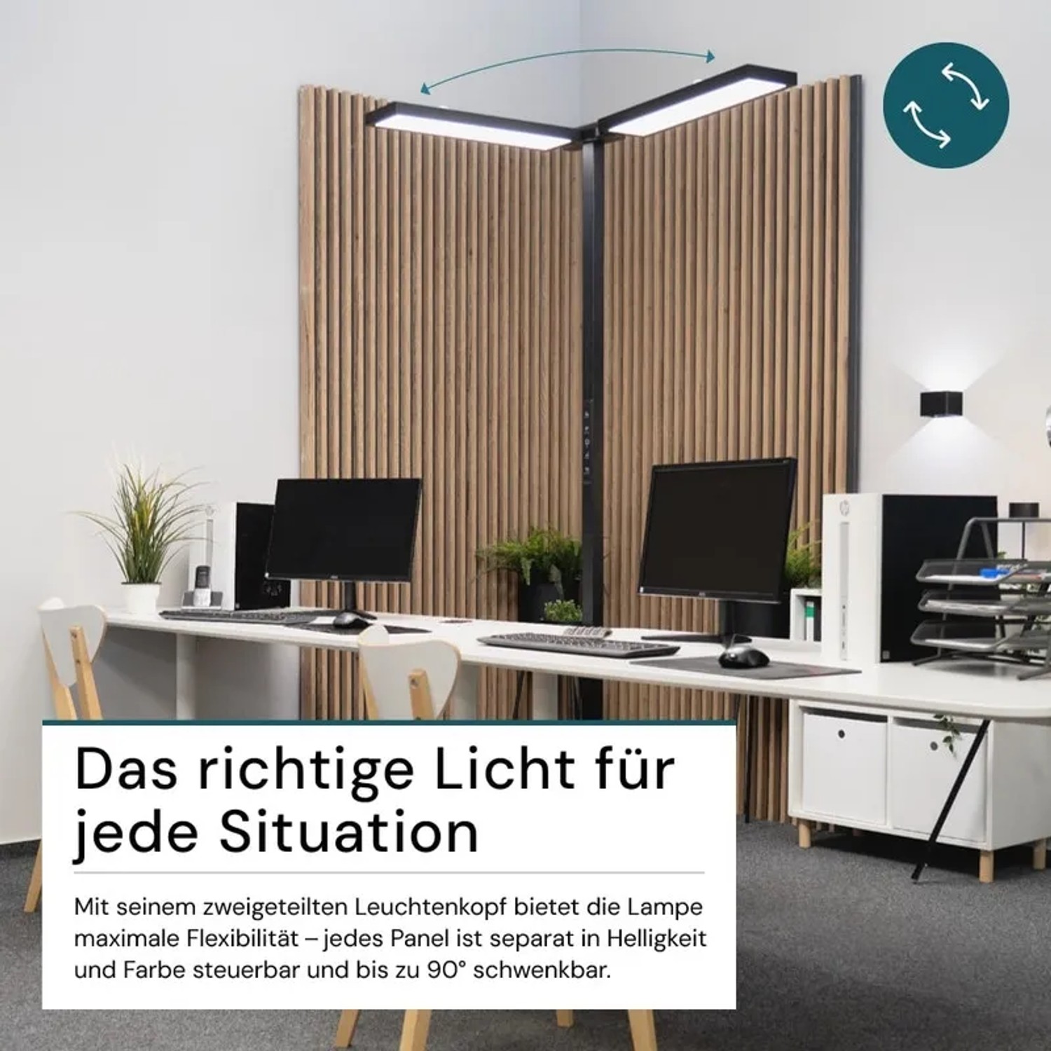Schwarze LUXULA LED Bürostehleuchte mit zwei Leuchtenköpfen an einem Schreibtisch.