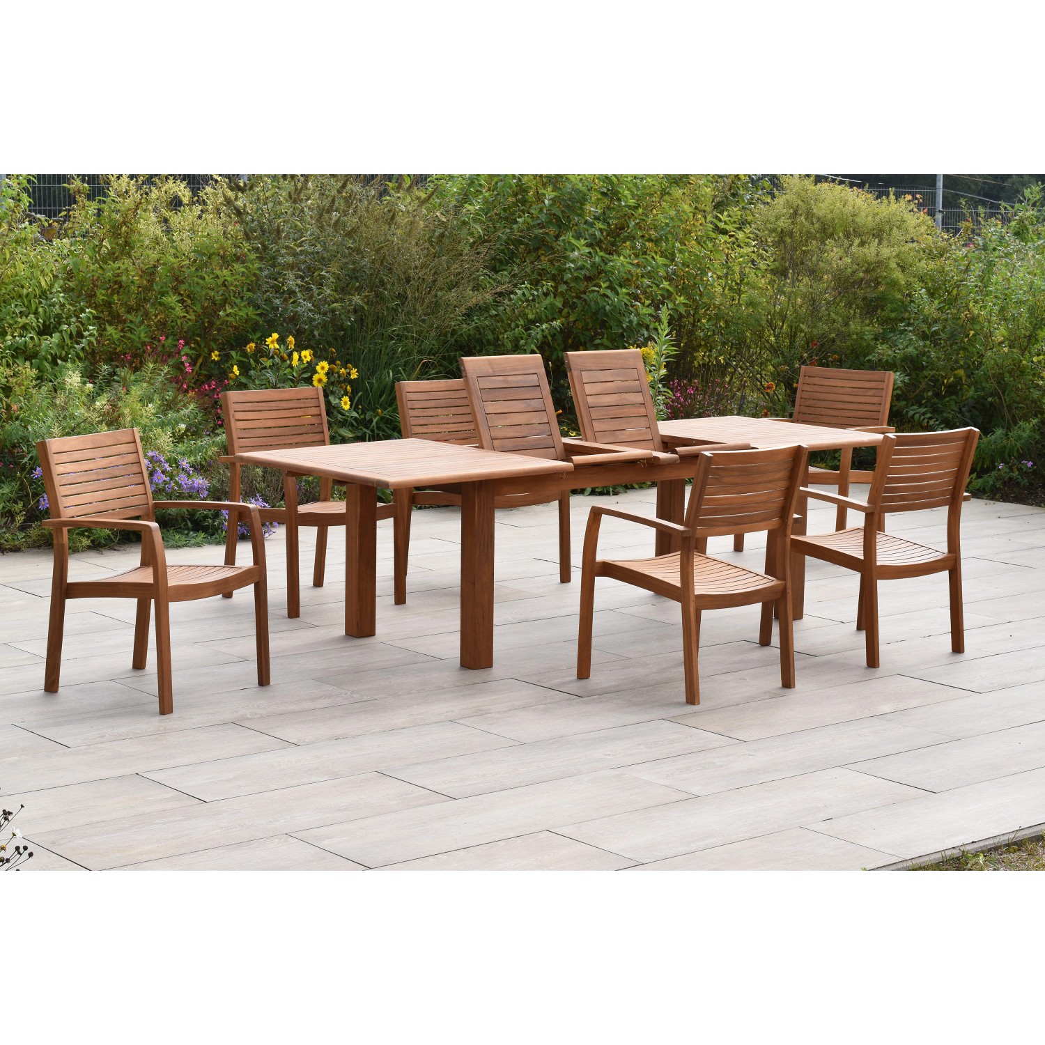 Merxx Batavia Gartenmöbel Set, 7-teilig: 6 Stapelsessel und ausziehbarer Gartentisch aus Akazienholz.
