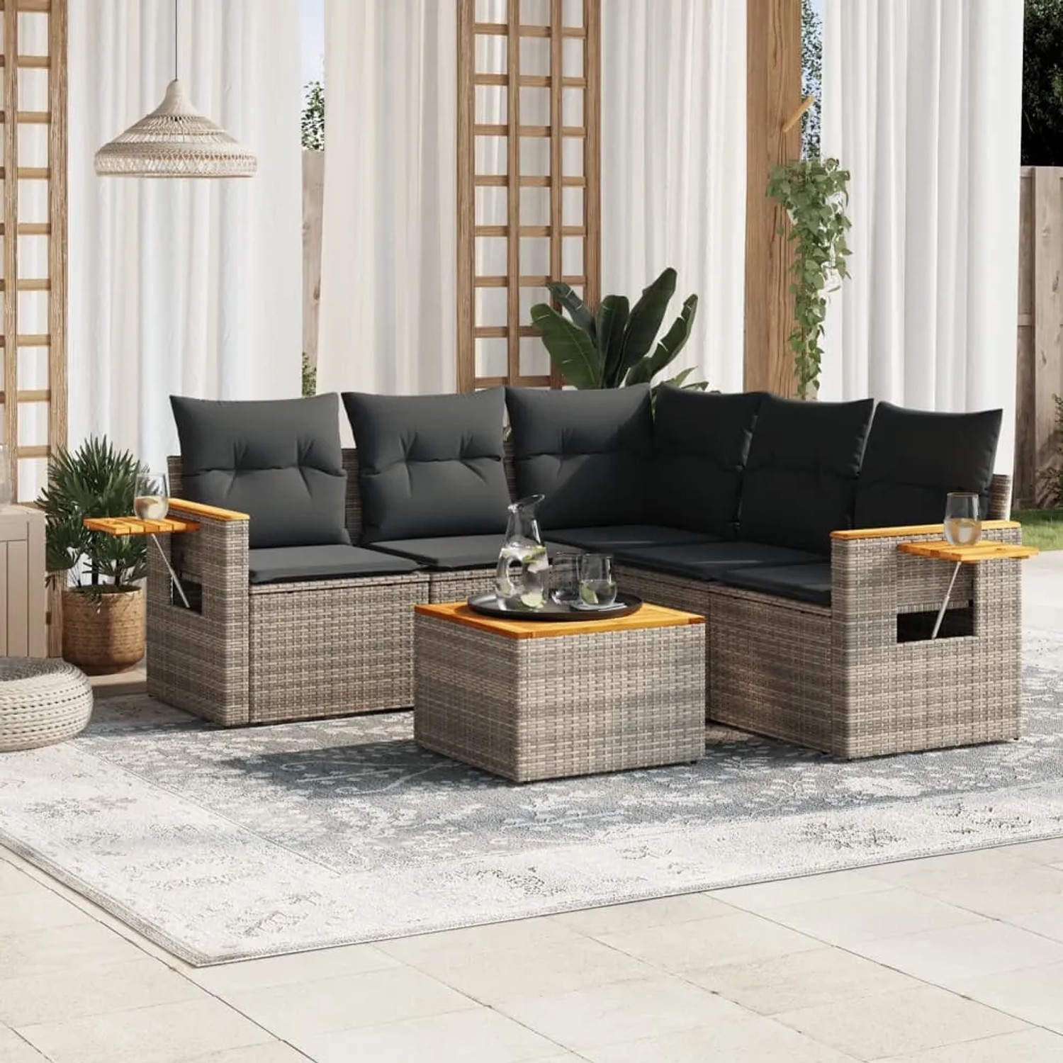 Graue 6-tlg. vidaXL Garten-Sofagarnitur aus Polyrattan mit Kissen und Tisch.