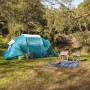 Blaues Pavillo Family Ground 4 Zelt für 4 Personen beim Camping im Grünen.