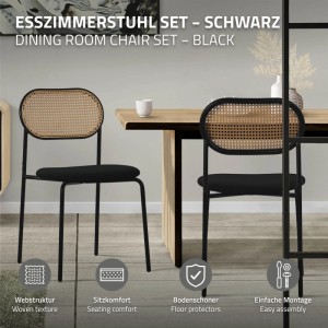Schwarze Esszimmerstühle, 4er Set, mit Rattan-Rückenlehne und gepolsterter Sitzfläche im modernen Esszimmer.