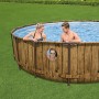 Bestway Stahlrahmenpool Set Power Steel Swim Vista, Ø 549 cm, brauner Pool mit Holzoptik und Personen.
