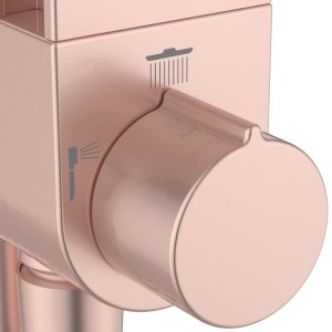 Detailaufnahme: Roséfarbenes Ideal Standard Duschsystem ohne Thermostat, 2 Funktionen.