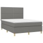 Dunkelgraues vidaXL Boxspringbett 140x190 cm mit Matratze und Kopfteil.