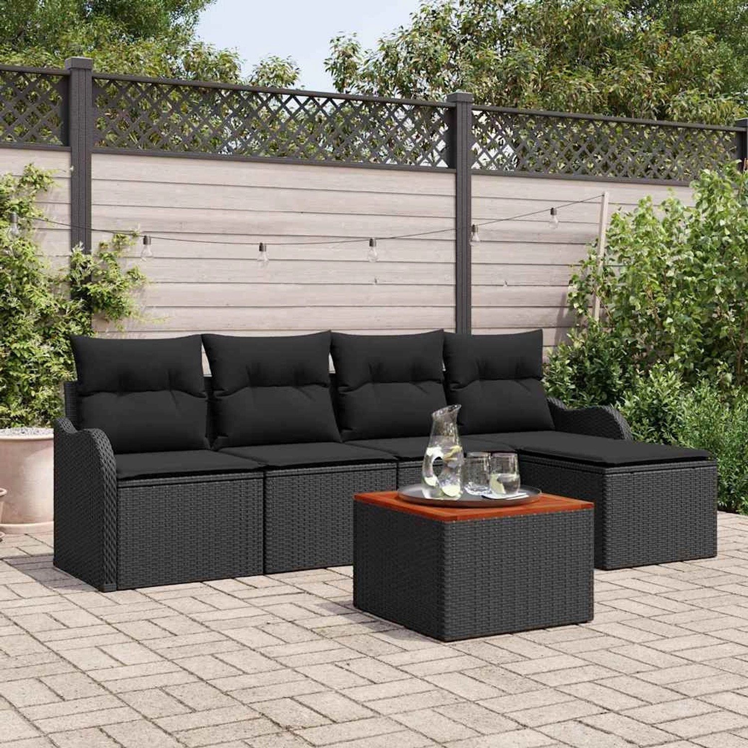 Schwarzes 6-teiliges Garten-Sofa-Set aus Poly Rattan mit Tisch für Terrasse und Garten.