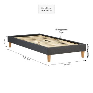 Graues Polsterbett 90x200 cm mit Lattenrost und Holzfüßen. Bett für Jugendzimmer oder Gästezimmer.